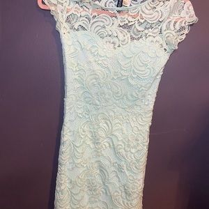 Small tight teal dress. Only worn a couple of times. In good condition.